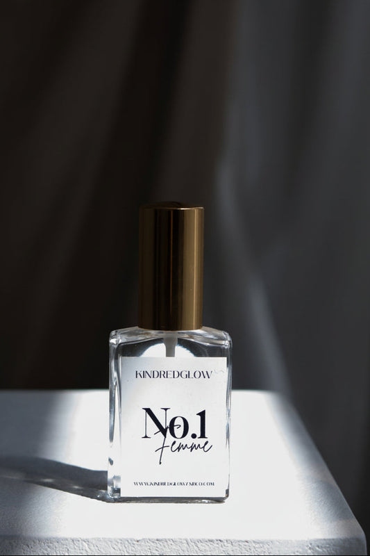 Perfume bottle labeled 'No. 1' on a dark background